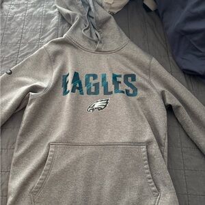 Under Armour Gray Hoodie with green Eagles Accents and logo